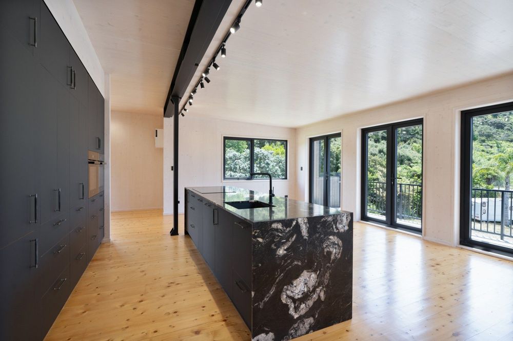 Kitchen wide angle with marble and Italian mountain spruce